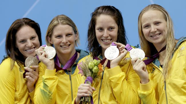 Emily Seebohm and Leisel Jones celebrate winning silver together in London. Picture: AP