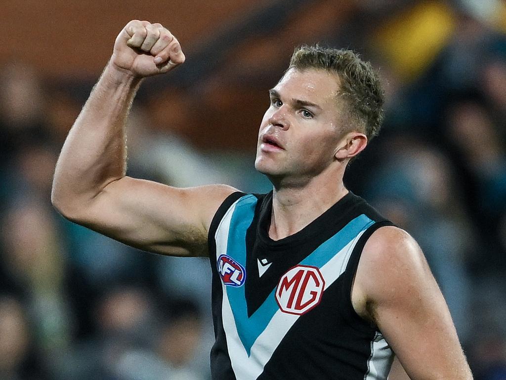 ADELAIDE, AUSTRALIA - AUGUST 03: Dan Houston of the Power celebrates a goal during the round 21 AFL match between Port Adelaide Power and Sydney Swans at Adelaide Oval, on August 03, 2024, in Adelaide, Australia. (Photo by Mark Brake/Getty Images)