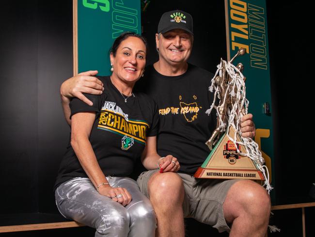 Tasmania JackJumpers CEO Christine Finnegan and Head Coach, Scott Roth with the 2023-24 NBL trophy. Picture: Linda Higginson/Tasmania JackJumpers