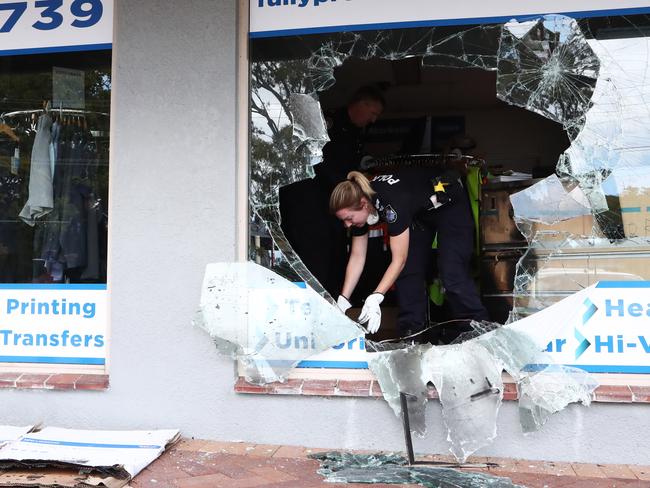 Police at the scene of a fire at Fully Promoted in Nerang St, Nerang.Photograph : Jason O'Brien