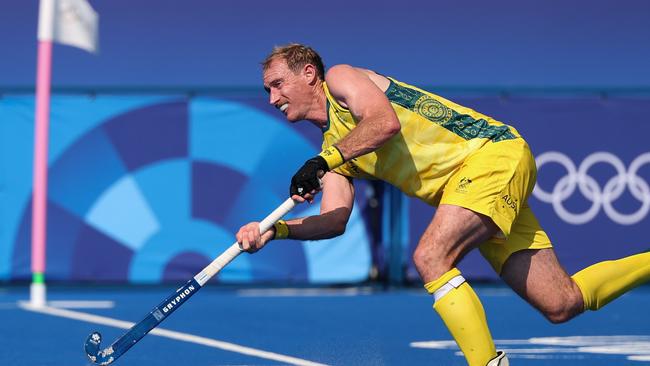 PARIS, FRANCE - JULY 29: Aran Zalewski of Team Australia passes the ball in a penalty corner during the Men's Pool B match between Ireland and Australia on day three of the Olympic Games Paris 2024 at Stade Yves Du Manoir on July 29, 2024 in Paris, France. (Photo by Lintao Zhang/Getty Images)