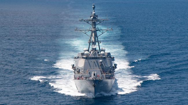 The AI Arleigh-burke class guided-missile destroyer USS Kidd (DDG 100) transits the Taiwan Strait during a routine transit.