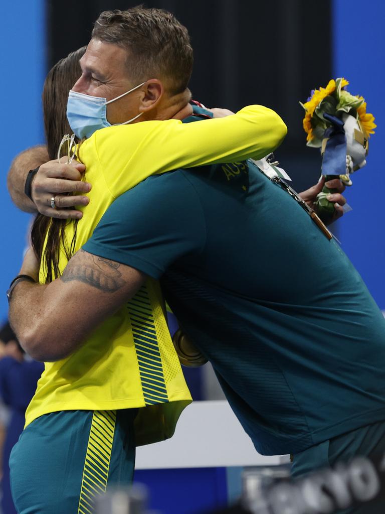 Kaylee hugs her coach David Mooney. Picture: Alex Coppel