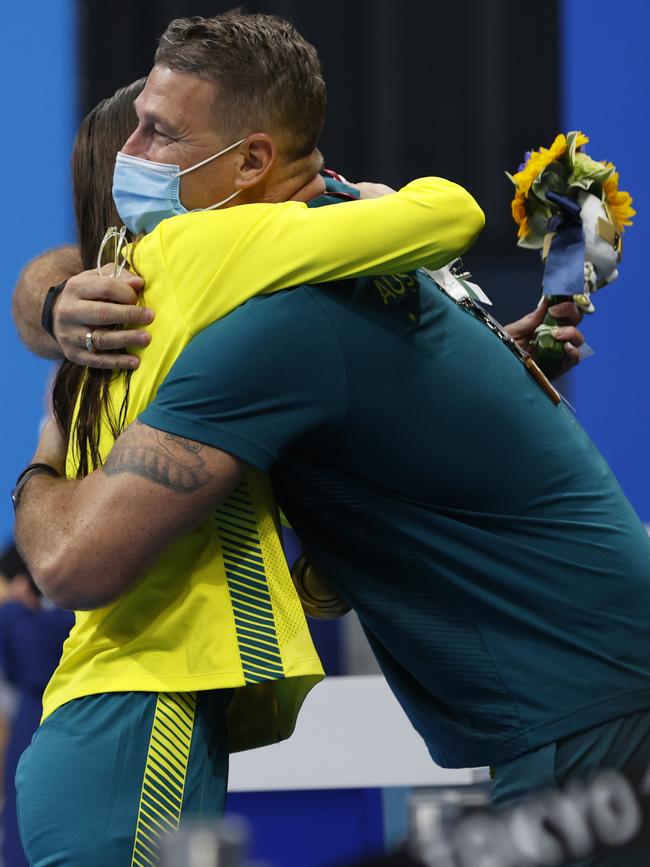 Kaylee hugs her coach David Mooney. Picture: Alex Coppel