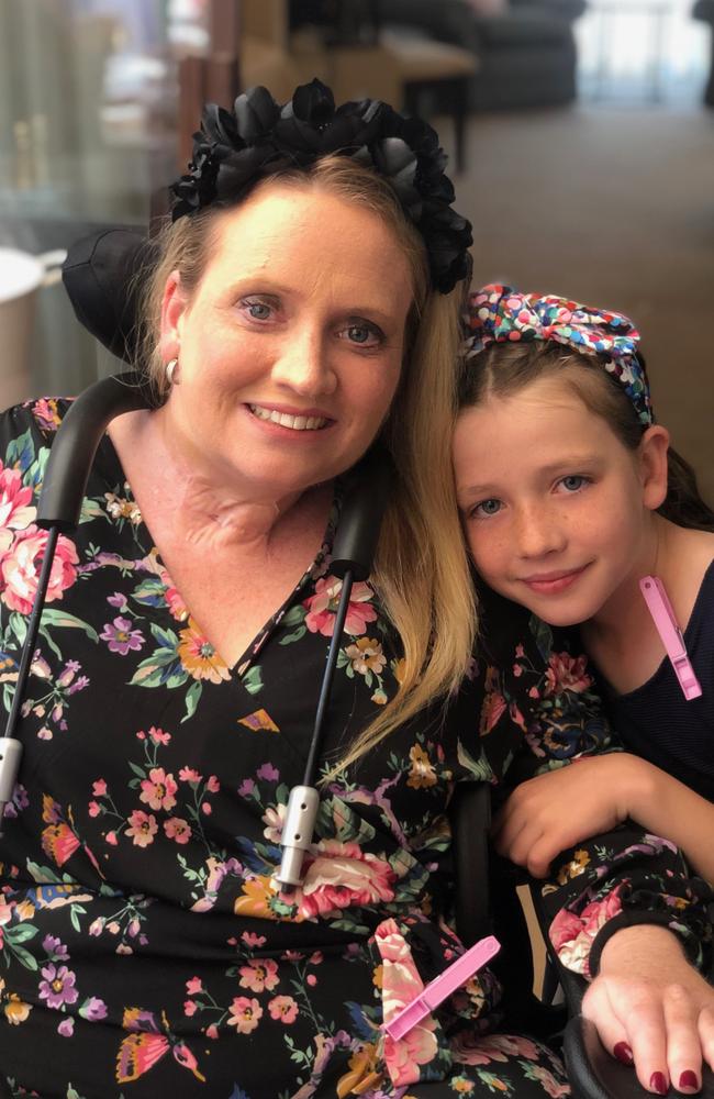 Claire Willmott, of North Curl Curl, who suffered severe spinal injuries after a zip line accident, pictured with her daughter Taylor, 9. Picture: Supplied.