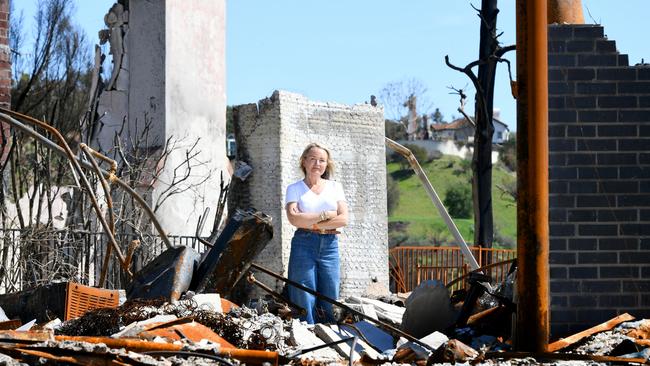 Kate Vale is pictured at the ruins of her Pacific Palisades home. Photo: Jeff Rayner/Coleman-Rayner