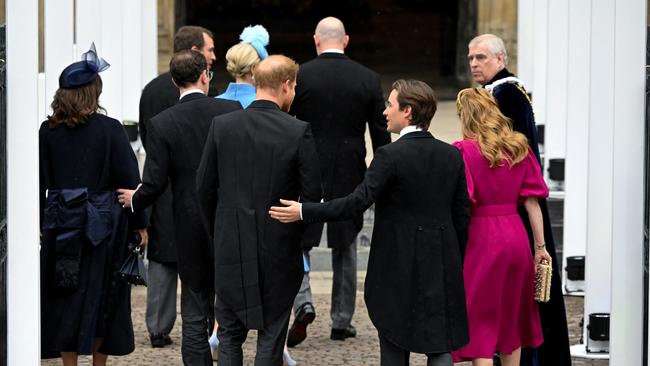 The nieces and nephews, including Prince Harry, arrive as Prince Andrew looks on. Picture: Getty Images