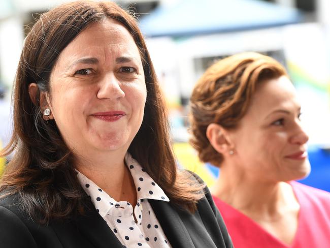 Queensland Premier Annastacia Palaszczuk (left) and Deputy Premier Jackie Trad are seen during the launch of the annual Severe Weather and Tropical Cyclone Outlooks for the 2017-18 season and to mark the beginning of Get Ready Week with the Bureau of Meteorology at King George Square in Brisbane,  Monday, October  9, 2017.  (AAP Image/Dave Hunt) NO ARCHIVING