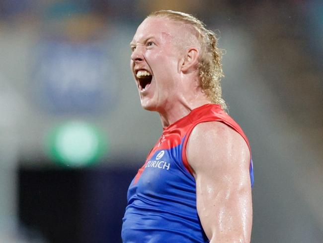 BRISBANE, AUSTRALIA - MARCH 24: Clayton Oliver of the Demons celebrates a goal during the 2023 AFL Round 02 match between the Brisbane Lions and the Melbourne Demons at the Gabba on March 24, 2023 in Brisbane, Australia. (Photo by Russell Freeman/AFL Photos via Getty Images)