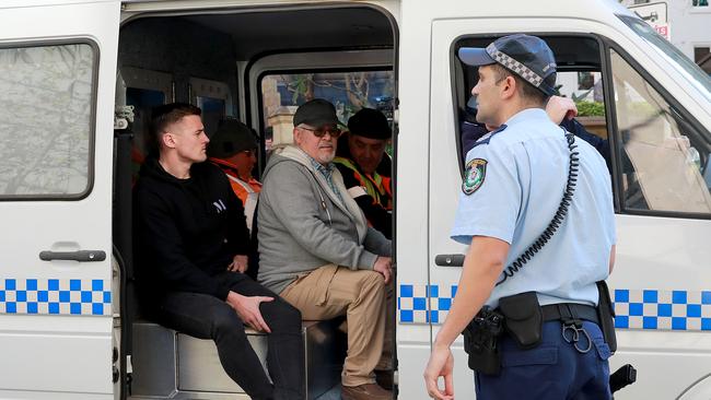 Luke O’Shaughnessy (black jumper) stopped Ney with a milk crate. Picture: Toby Zerna