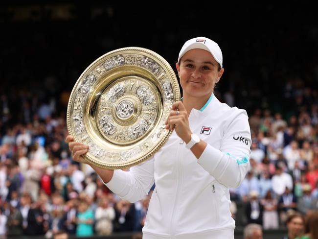 Ashleigh Barty of Australia celebrates with the Venus Rosewater Dish trophy after winning the Ladies' Singles title at Wimbledon in 2021. Picture: Clive Brunskill/Getty Images