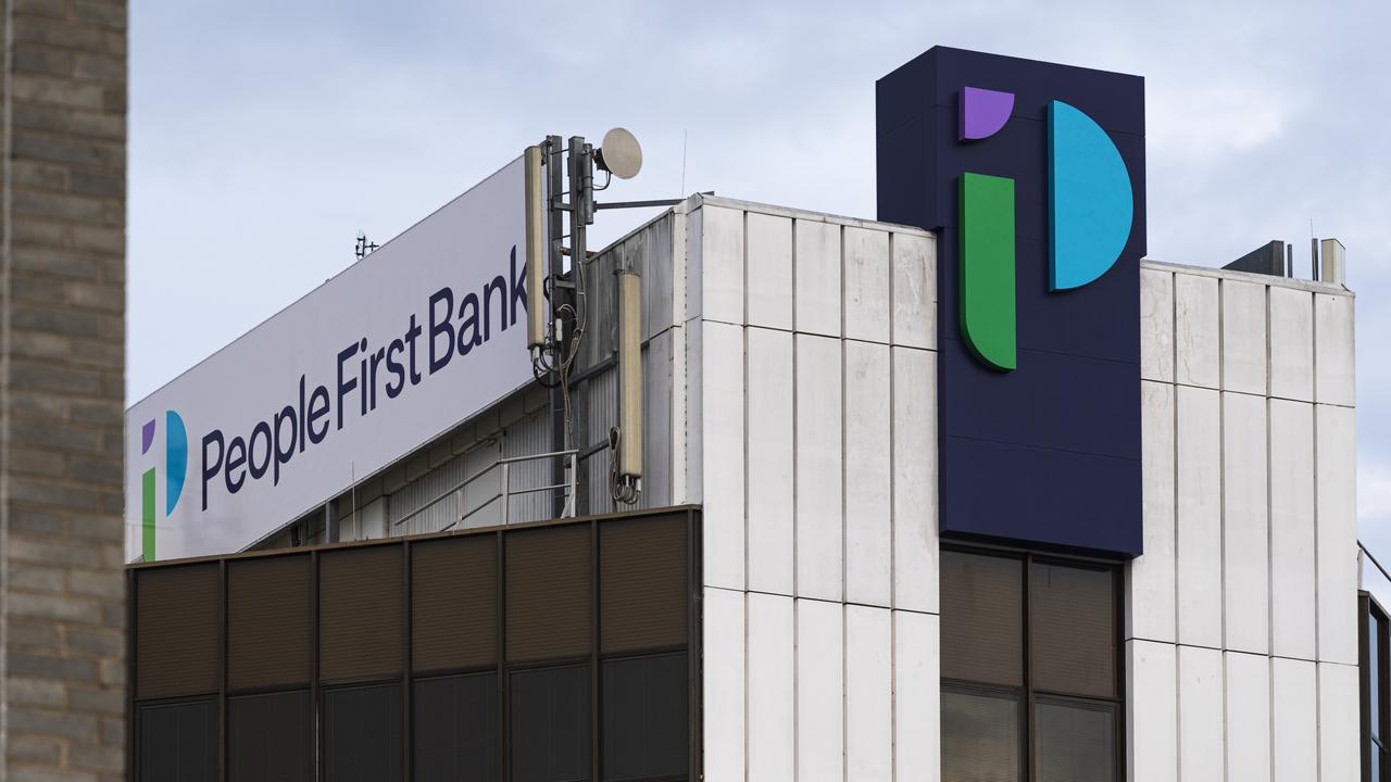 Heritage Bank head office building in Ruthven St now displays the merged rebranded name of People First Bank, Friday, June 21, 2024. Picture: Kevin Farmer