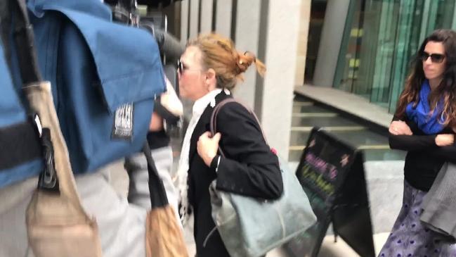 Lisa Barrett leaves court after pleading not guilty to manslaughter in 2018