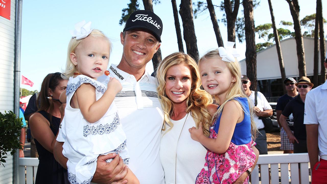 Matt Jones with his wife Melissa and daughters Saber and Savannah after winning the 2015 Australian Open Golf at The Australian in Sydney. Picture. Phil Hillyard