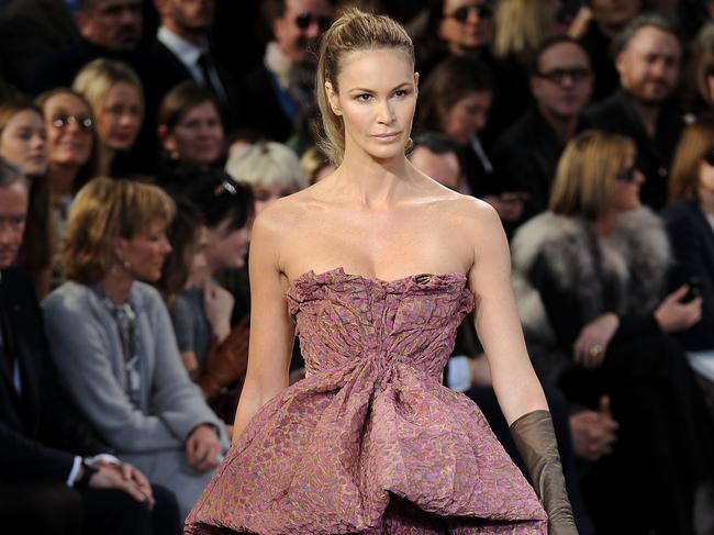 PARIS - MARCH 10:   Model Elle MacPherson walks the runway the Louis Vuitton Ready to Wear show as part of the Paris Womenswear Fashion Week Fall/Winter 2011 at Cour Carree du Louvre on March 10, 2010 in Paris, France.  (Photo by Dominique Charriau/WireImage)