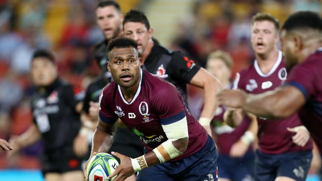 BRISBANE, AUSTRALIA - MAY 03: Samu Kerevi of the Reds passes during the round 12 Super Rugby match between the Reds and the Sunwolves at Suncorp Stadium on May 03, 2019 in Brisbane, Australia. (Photo by Chris Hyde/Getty Images for SUNWOLVES)