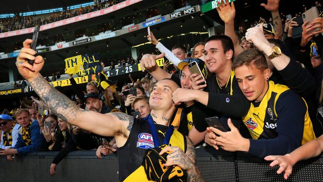 Richmond fans enjoy their grand final triumph with Dustin Martin last year.