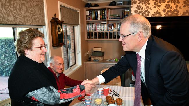 Prime Minister Scott Morrison visits Ray and Wendy White, who receive residential care at their home in Greenway, Canberra, Tuesday, September 18, 2018. (AAP Image/Mick Tsikas) NO ARCHIVING