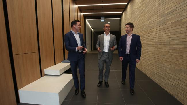 David Greig, Shane Quinn and Wes Self in the ground floor entry to the building. Picture: Alan Barber