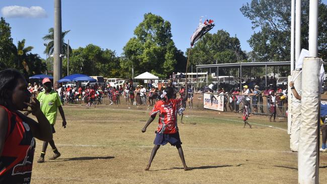 Thunder fans celebrating a goal at the Tiwi Island Football League grand final between Tuyu Buffaloes and Pumarali Thunder. Picture: Max Hatzoglou