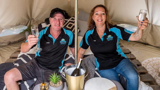 Valleyview Caravan Park owners John and Sue Remman show off a glamping tent set up by King Valley Glamping at their site. Picture: Jake Nowakowski