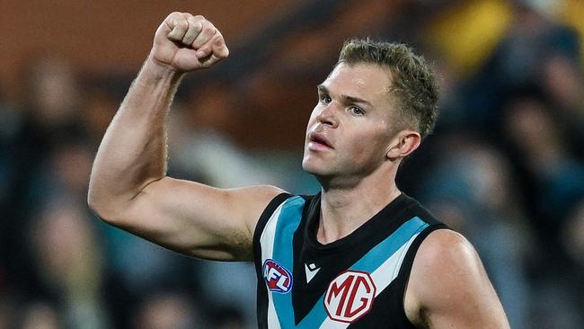 ADELAIDE, AUSTRALIA - AUGUST 03: Dan Houston of the Power  celebrates a goal  during the round 21 AFL match between Port Adelaide Power and Sydney Swans at Adelaide Oval, on August 03, 2024, in Adelaide, Australia. (Photo by Mark Brake/Getty Images)