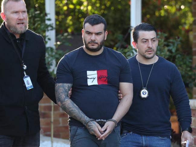 NSW Police arrest Enzo Guarinoni, 33, who is alleged to be a significant player in a Middle Eastern drug operation. Picture: John Grainger