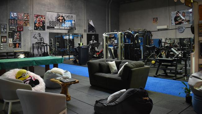 A circle of chairs, beanbags and a comfortable couch are nestled among Leon Stensholm's gym, where young people are invited to come in and comfortably discuss their issues and get the support they need.