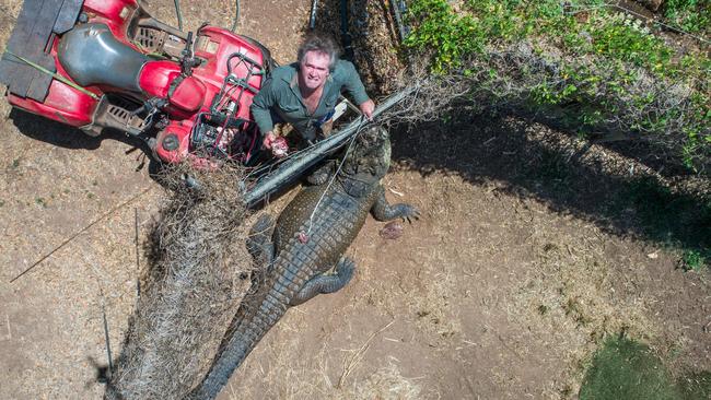 Trevor Sullivan feeds his 106-year-old rescue croc Shah. Picture: Pema Tamang Pakhrin