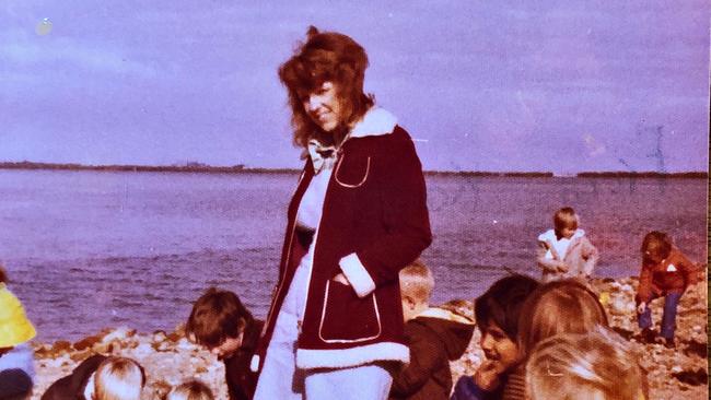 Teacher Anita Hudd on an excursion to St Kilda beach with Reception students in 1976. Picture: Supplied