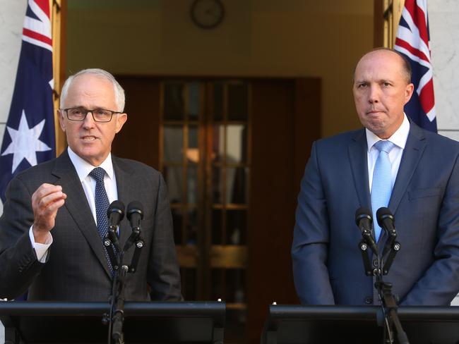 Malcolm Turnbull and Peter Dutton at Parliament House press conference announcing the visa changes. Picture Kym Smith