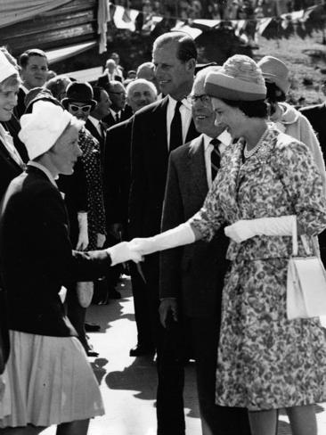 The Queen meets young swimmer Margaret Stanfield in 1963.