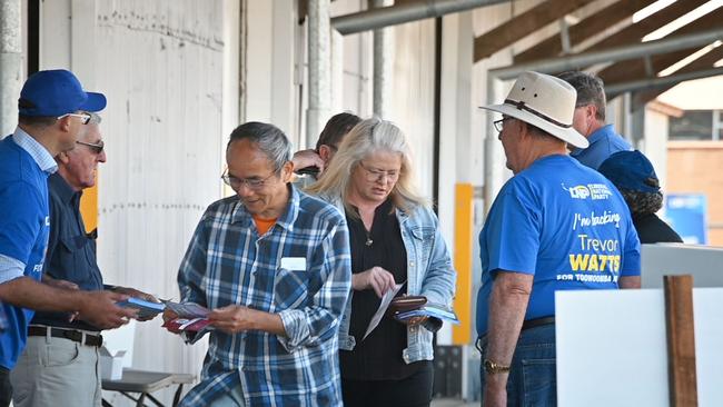 Toowoomba voters take advantage of the opening of polling booths and cast their votes early for the state election.