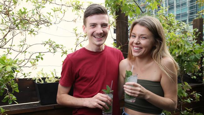 Sydney-sider Nick Constantine, 22 and his friend Laura Babbs, 23, from the UK at Old Mate's Place in the city. Picture: David Swift.