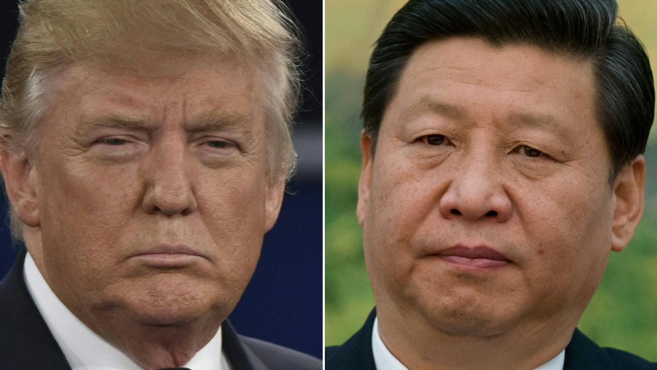 US President Donald Trump and China's leader Xi Jinping are still locked in an escalating trade war. Picture: Paul J Richards and Ed Jones/AFP