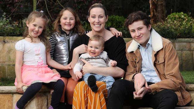 Former Olympian and now doctor Jana Pittman with her children Charlie, 9 months, Jemima 4, Emily 6, and Cornelis, 14.