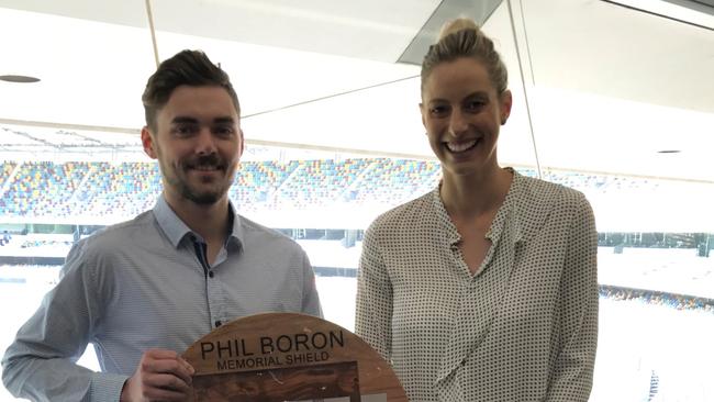 Queensland shopfitter Jayden Wood with netballer Laura Geitz. Photo: Supplied