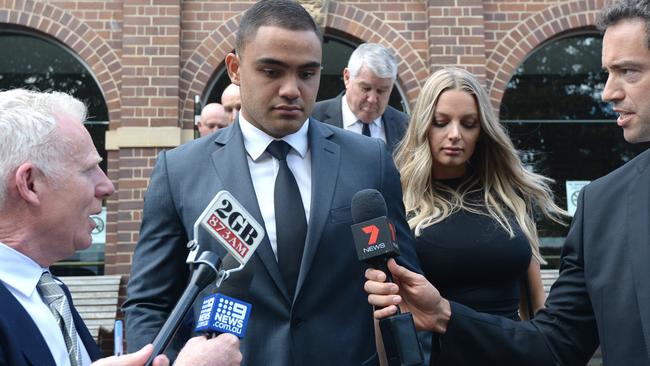 Dylan Walker and fiance Alexandra Ivkovic leave Manly Court. (AAP Image/Jeremy Piper)