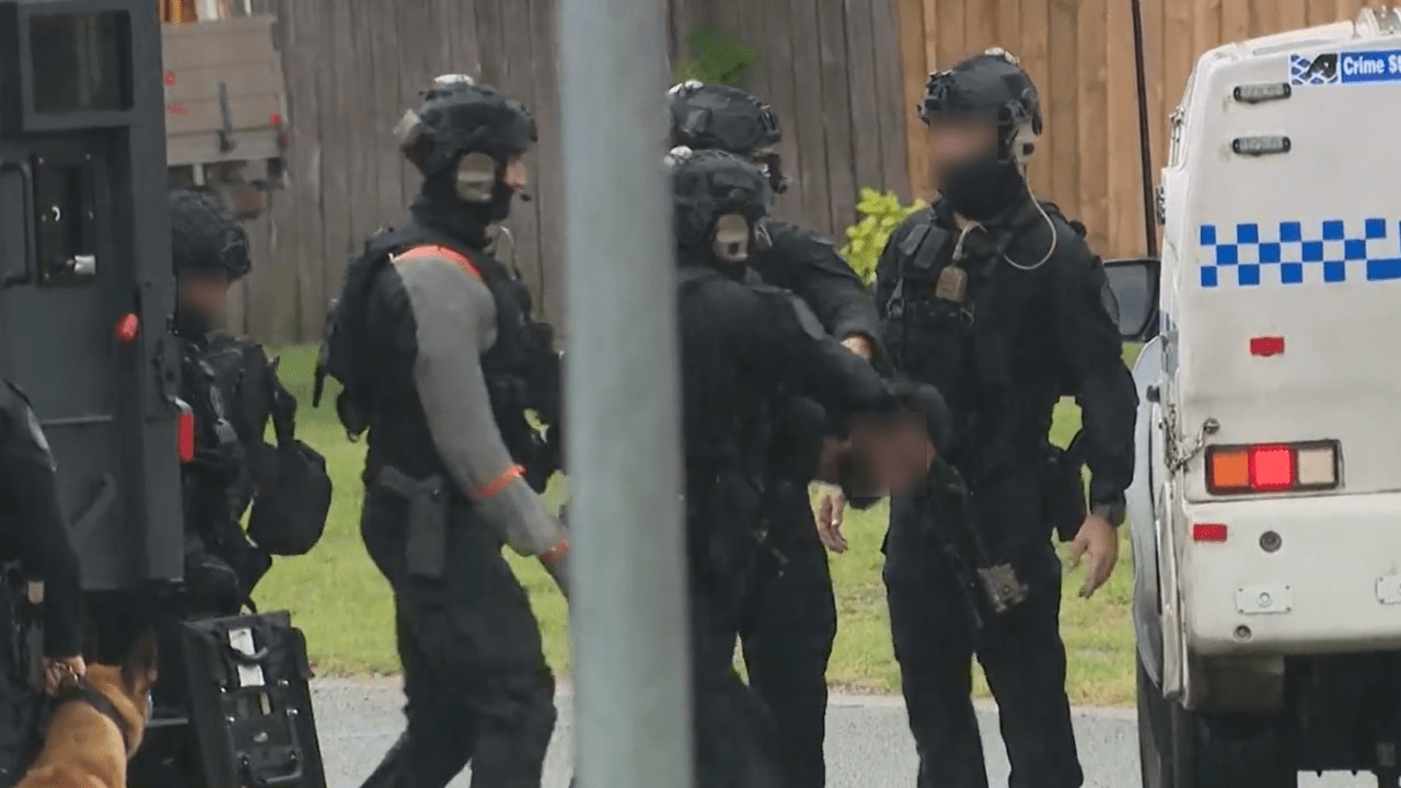 Man arrested by heavily armed tactical police after hours-long siege in ...