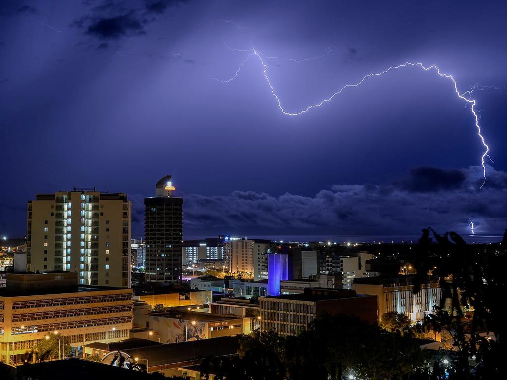 Townsville Bulletin photographer Matt Taylor captured the stunning thunderstorm that rolled over the region. The images are taken looking south toward Cape Cleveland.