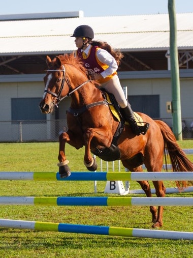 Arielle Yunus and her horse My Triple Heart at the PQC State Showjumping Championships.