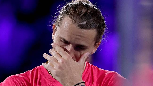 TOPSHOT - Germany's Alexander Zverev reacts after losing the men's singles final match against Italy's Jannik Sinner on day fifteen of the Australian Open tennis tournament in Melbourne on January 26, 2025. (Photo by Martin KEEP / AFP) / -- IMAGE RESTRICTED TO EDITORIAL USE - STRICTLY NO COMMERCIAL USE --