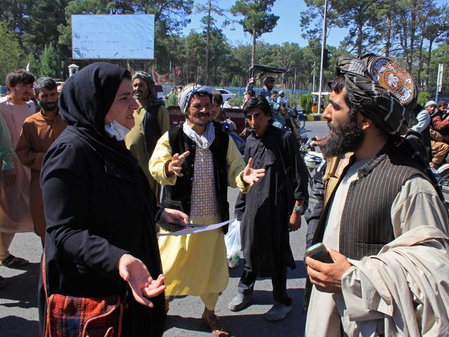 An Afghan woman protester argues with a member of the Taliban during a protest in Herat. Picture: AFP