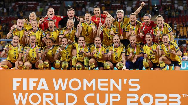 Sweden’s players celebrate with their third place medals. Picture: Getty Images