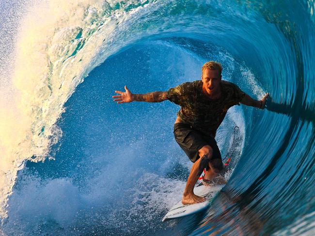 2015 Nikon Surf Photo of the Year Top 20 finalist Picture: Simon Williams Happy chip Chipper Wilson in the pit in Indo