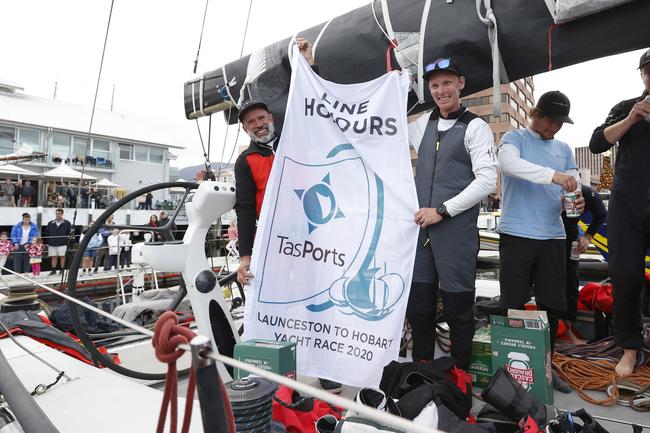 Alive skipper Duncan Hine and Luke Watkins as Alive claimed line honours in the 2020 Launceston to Hobart yacht race. Picture: Zak Simmonds