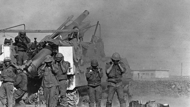 Israeli soldiers fire shells at the Syrian front lines during the Yom Kippur War in 1973. Picture: AFP