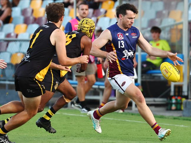 Lions' Matthew Howell clears the ball in the AFL Cairns premiership men's preliminary final match between the Cairns City Lions and the North Cairns Tigers, held at Cazalys Stadium, Westcourt. Picture: Brendan Radke