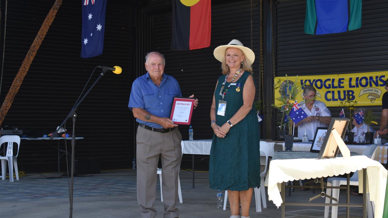 Australia Day ambassador Lyndey Milan presents the Senior Sportsperson of the Year award to Peter Anderson.