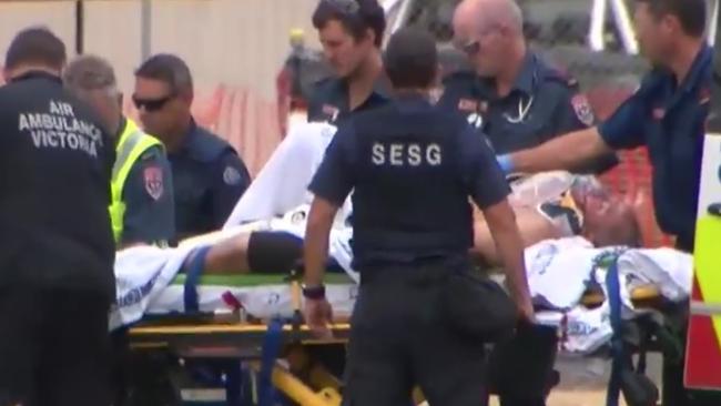 Tony Mokbel is worked on by paramedics at Barwon Prison after being stabbed last Monday. Picture: Nine News